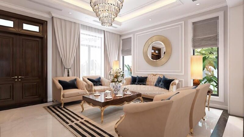 Cửa chính 2 cánh phòng khách ấn tượng với đường vân đẹp mắt cùng gam trầm độc đáo từ gỗ óc chó tự nhiên cao cấp. Thiết kế phòng khách biệt thự