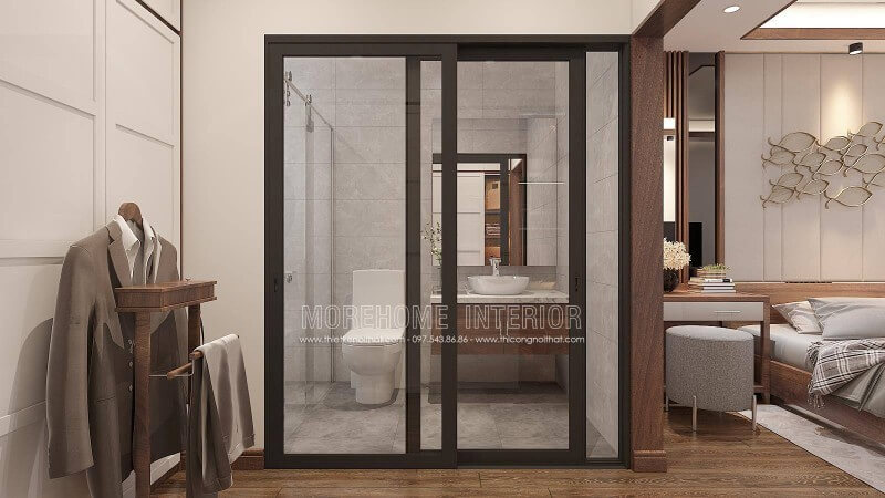 Thường với xu hướng bố trí nội thất mở, bạn sẽ đi thẳng từ phòng ngủ đến phòng tắm nhưng với cách bố trí tủ quần áo như trên thì việc bố trí lối đi qua phòng thay đồ rồi đến nhà tắm là một ý tưởng khá khéo léo. Thiết kế phòng ngủ biệt thự