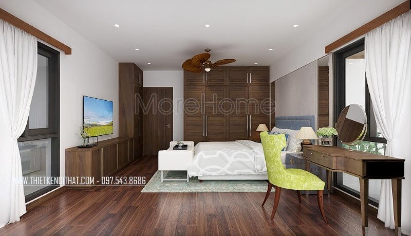 Sàn gỗ, bộ bàn ghế trang điểm, tủ quần áo, kệ tivi, cửa gỗ gỗ óc chó đã tạo nên vẻ đẹp sang trọng, độc đáo trong phong cách hiện đại tại phòng ngủ vợ chồng mặc dù với phong cách này đồ nội thất gỗ công nghiệp thường là lựa chọn phổ biến. Thiết kế phòng ngủ biệt thự