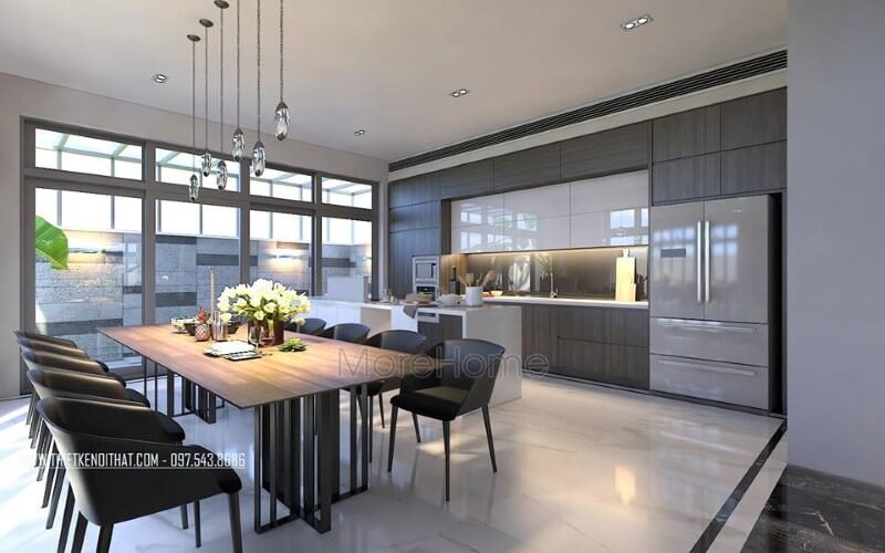 Bàn ghế ăn hiện đại đẹp sang trọng với sự kết nối đồng điệu giữa chiếc bàn gỗ chân sắt sang trọng cùng bộ 8 ghế sẫm màu. Thiết kế nội thất phòng ăn biệt thự