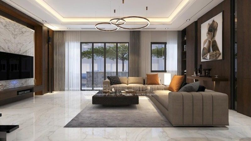 Nếu là người ưa thích sự nhẹ nhàng, một không gian sử dụng gam màu gỗ từ tấm ốp tường cùng màu nâu ghi bộ sofa góc. Bạn có thể tham khảo chi tiết mẫu thiết kế biệt thự tại Park City hoặc đa dạng hơn nữa tại website:thietkenoithat.com