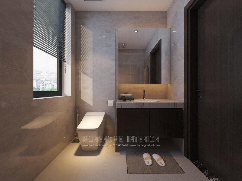 Tủ phòng tắm sẫm màu kết hợp cùng mặt bàn đá lavabor cùng sắp xếp hiện đại giúp cho phòng tắm nhỏ trở nên đẹp, sang trọng và đầy tiện ghi.